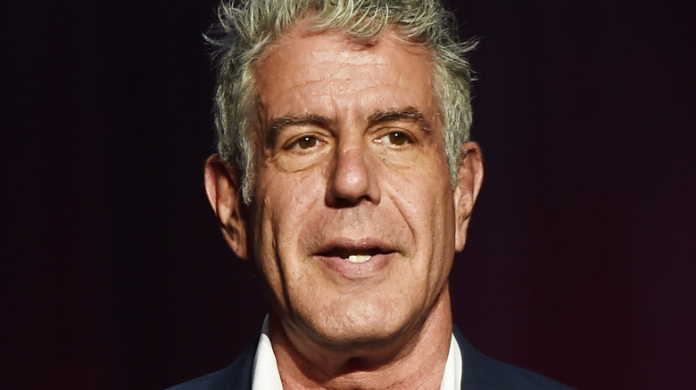 Anthony Bourdain posing for photo