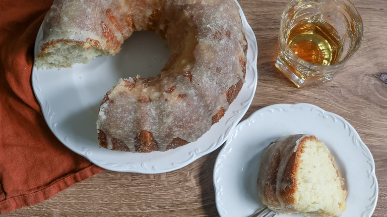 Glazed bourbon butter bundt cake served onto plate