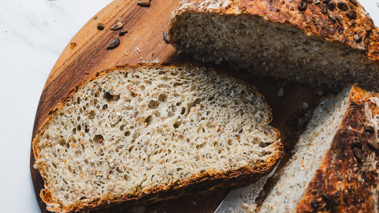 Bread loaf cut in two with slice taken out