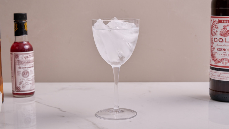 serving glass filled with ice