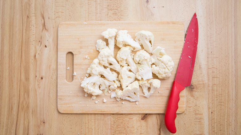 chopped cauliflower on board
