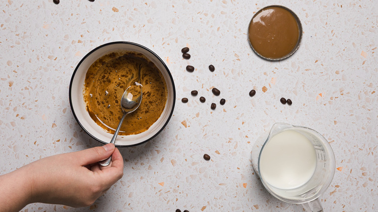 Mixing instant coffee in bowl