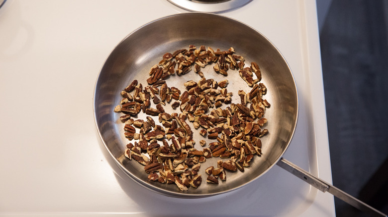 toasted pecans in stovetop skillet