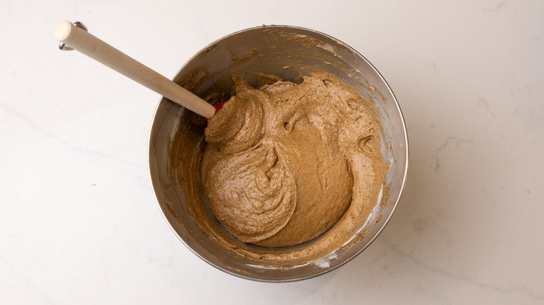 sticky toffee loaf cake batter in large mixing bowl