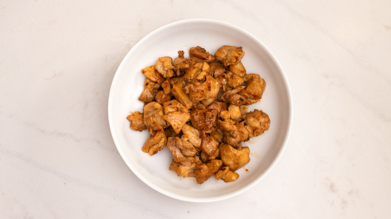 cooked marinaded chicken in bowl
