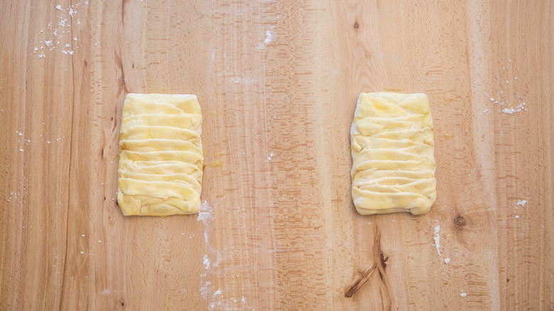 uncooked pastries on table