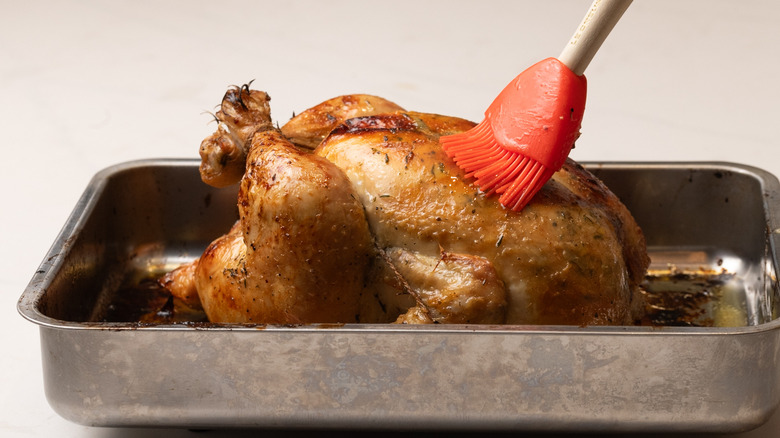 basting a roasting chicken