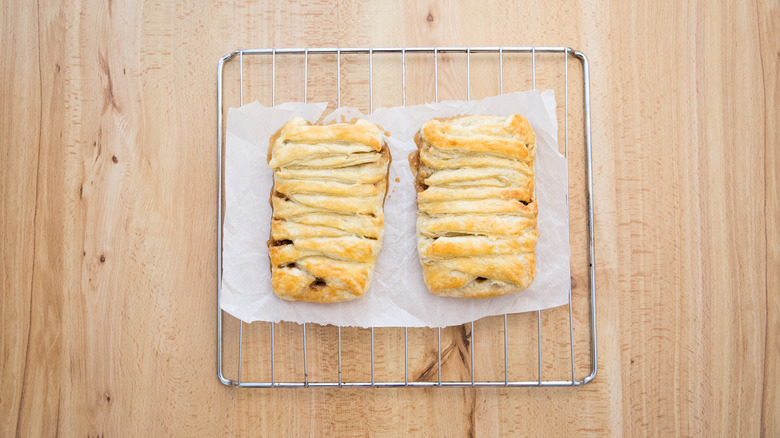 braided pastries on wire rack