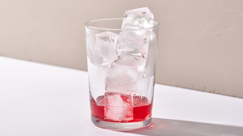 cherry juice in glass with ice