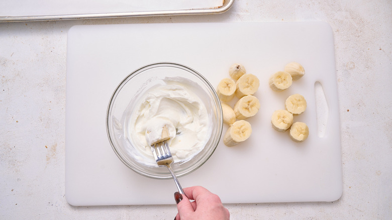 dipping bananas in yogurt