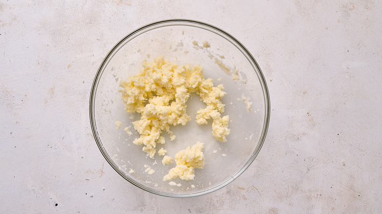 butter and sugar combined in a bowl