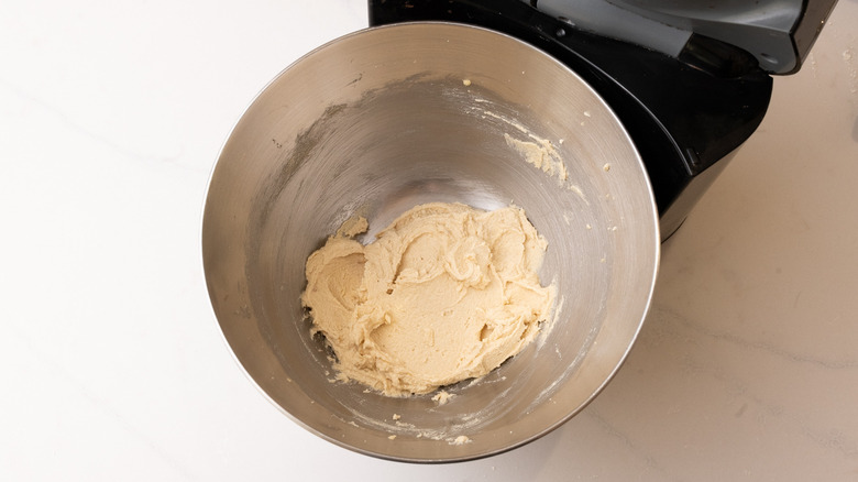 aerial view of creamed butter and sugar in a stand mixer bowl