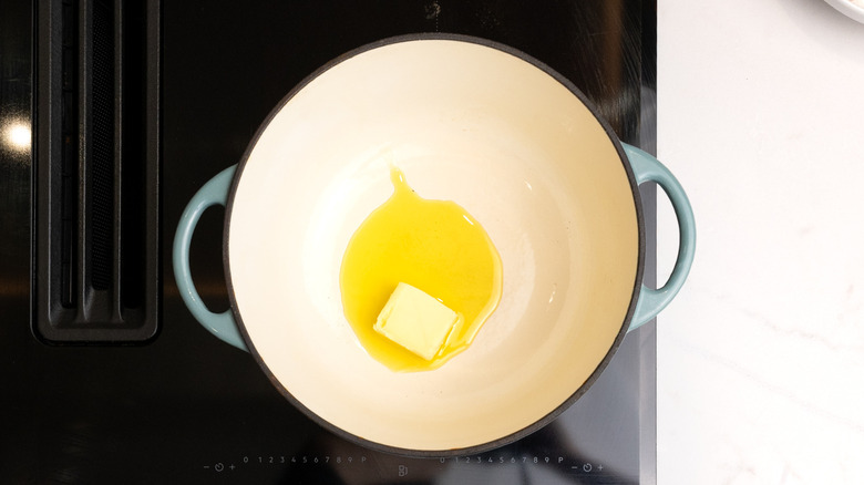 pan containing oil and butter