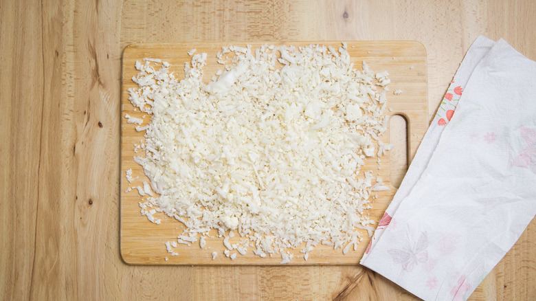 grated cauliflower on board