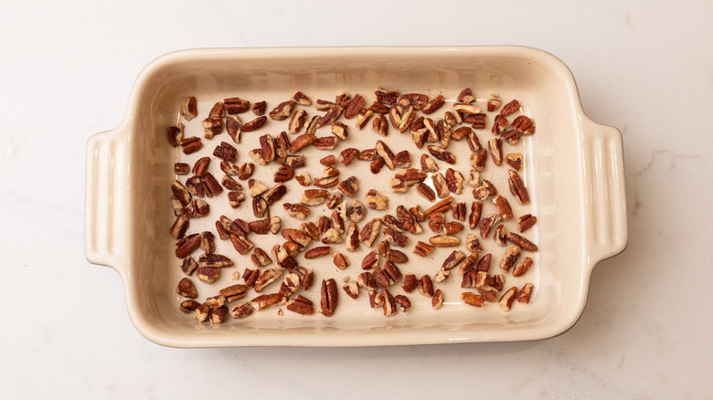 pecans in roasting dish