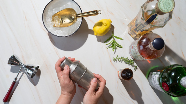 Hands shaking shaker