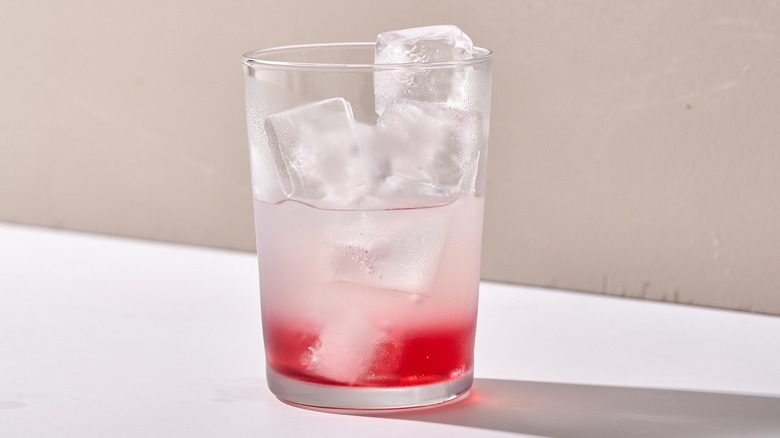 lemonade mixture in glass with ice