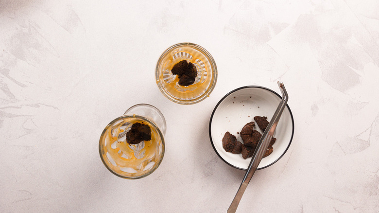 Brownie bits at the bottom of glass