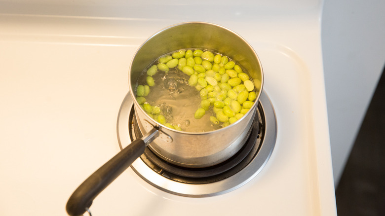 edamame boiling in small pot