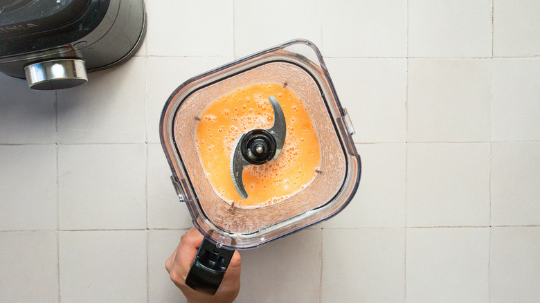 Liquid cantaloupe sorbet mix in blender