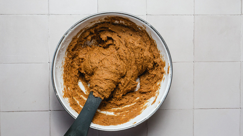 Pumpkin bread batter in large bowl