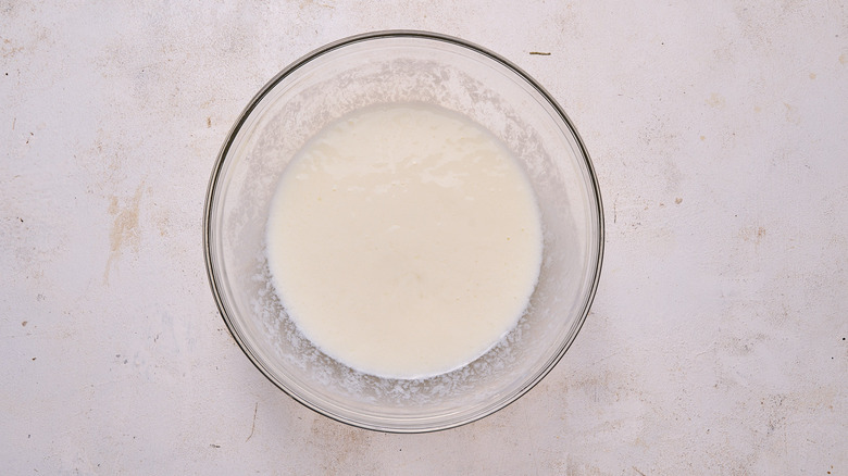 eggs and milk combined in a bowl