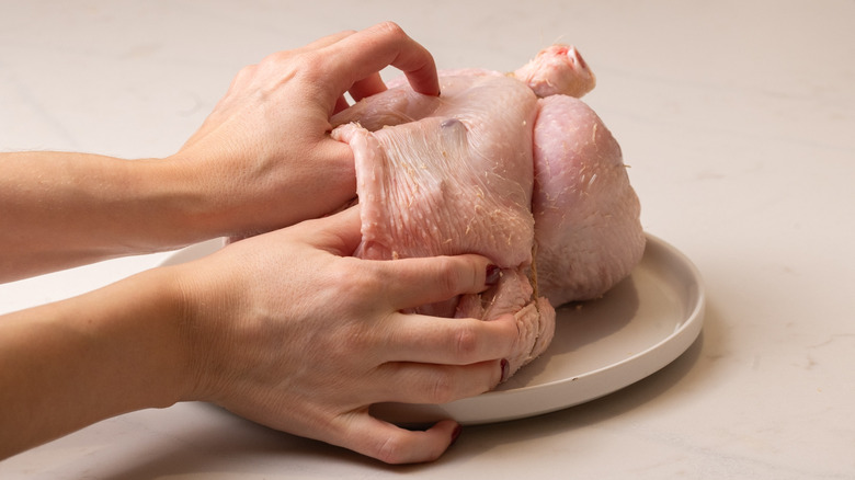 separating chicken skin from breasts