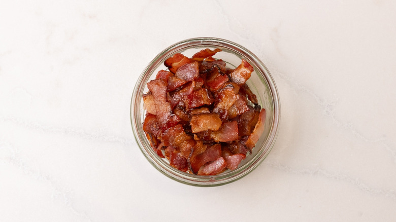 cooked bacon pieces in bowl