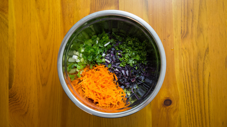 assorted vegetables in mixing bowl