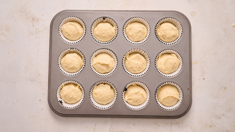 cupcake liners filled with batter
