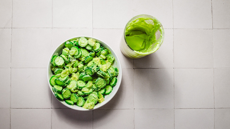 Green cucumber salad with dressing