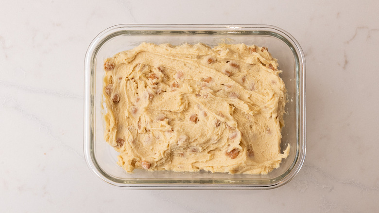 aerial view of raw cookie dough in a glass container