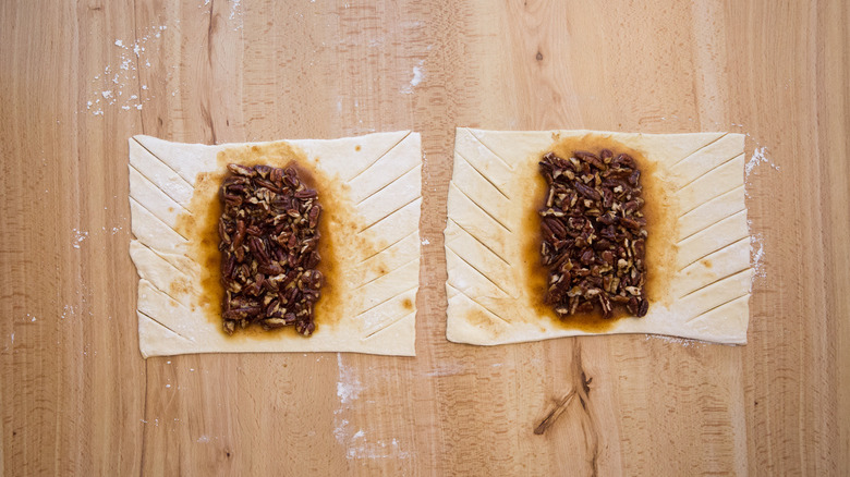 partially made pastries on table