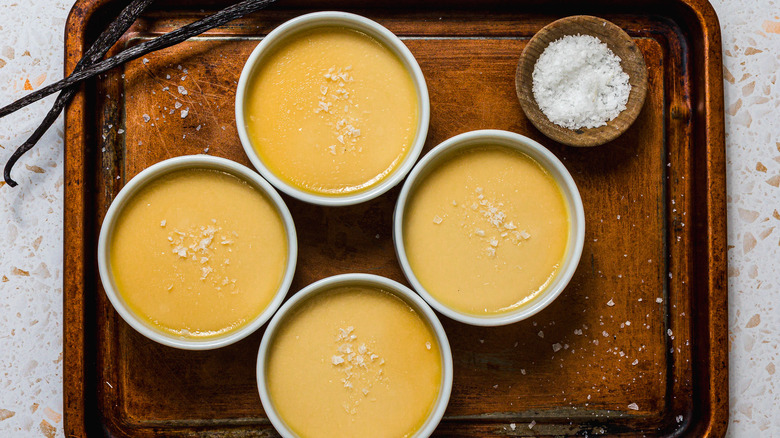 4 ramekins of salted caramel panna cotta