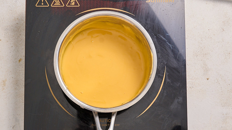 melting velveeta in a saucepan