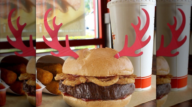 An Arby's Elk and venison Burger with cardboard antlers in the bun